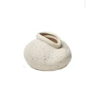 organic ceramic vase with black speckled dots - Chic entertaining must haves for hosting and serving by the savvy heart