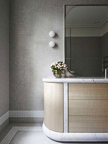 square mosaic tile bathroom with white tile trim