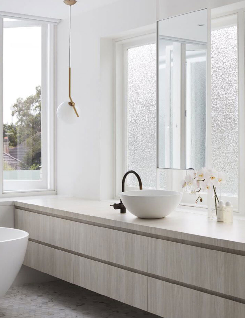 8 Bathrooms That Prove Why A Window Above A Vanity Is A Good Thing