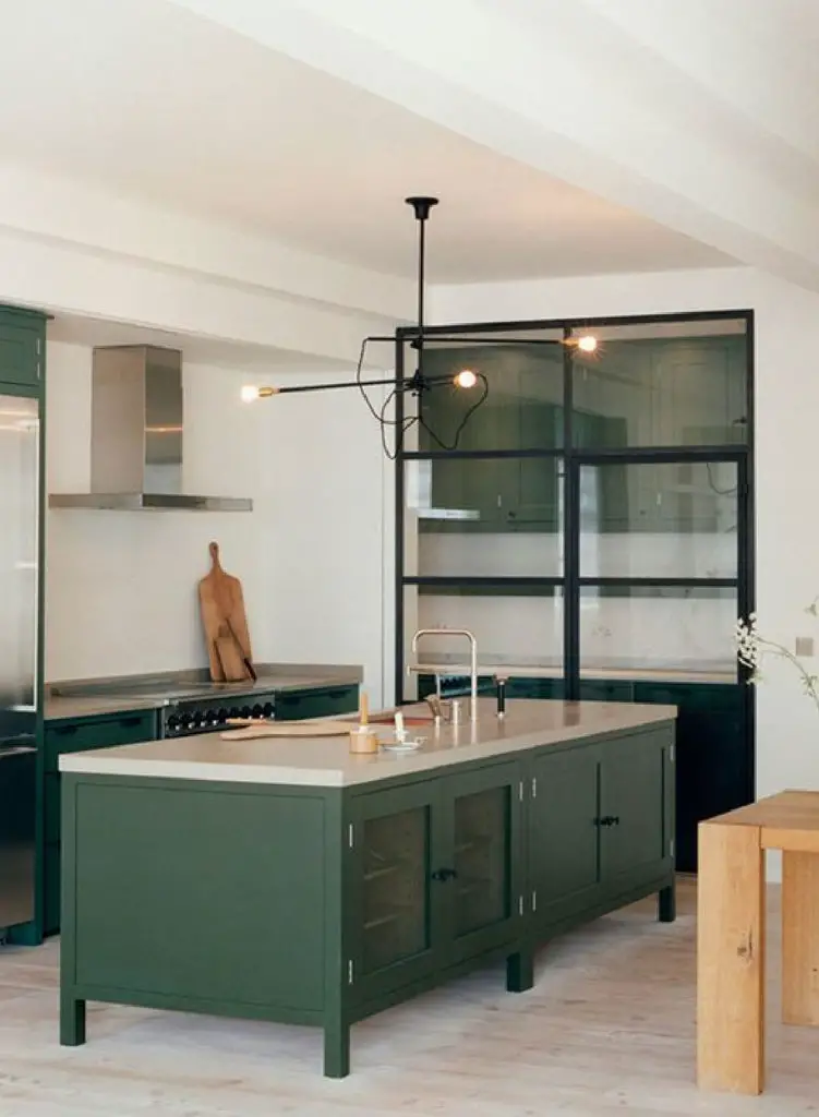 If you’re contemplating painting your kitchen cabinetry a dark hunter or forest green, then this post is for you! I’m sharing a ton of ideas for green kitchens and also sharing seven of my favorite dark green paint colors.